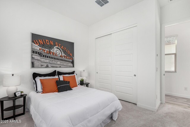 3089 N 200th Ave, Buckeye, AZ 85396 - bedroom featuring a closet, carpet flooring, and baseboards