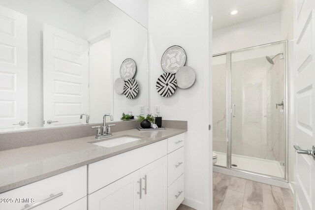 3089 N 200th Ave, Buckeye, AZ 85396 - full bathroom with a marble finish shower, toilet, vanity, and recessed lighting