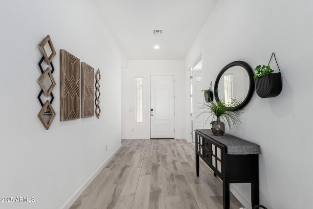 3089 N 200th Ave, Buckeye, AZ 85396 - entrance foyer with light wood-type flooring, baseboards, and recessed lighting