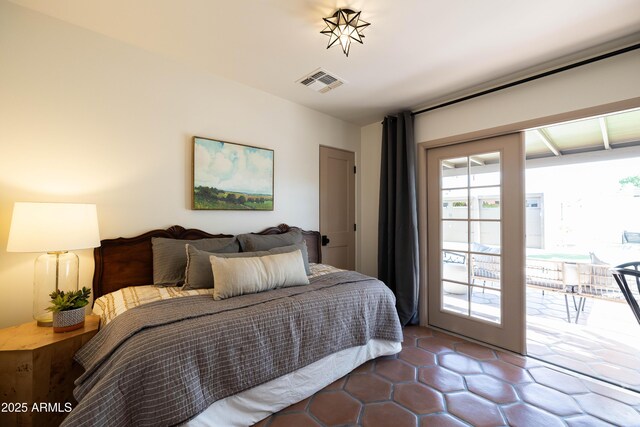 1309 W Lynwood St, Phoenix, AZ 85007 - tiled bedroom with access to exterior