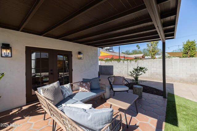 1309 W Lynwood St, Phoenix, AZ 85007 - view of patio / terrace featuring french doors, fence, and outdoor lounge area