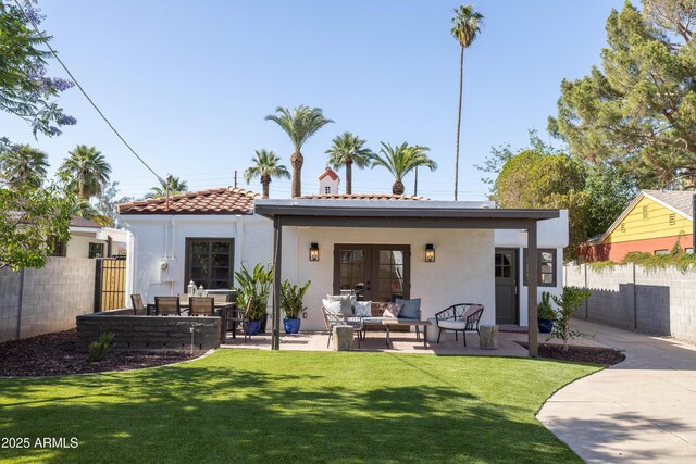 1309 W Lynwood St, Phoenix, AZ 85007 - rear view of property featuring an outdoor living space, stucco siding, french doors, a tiled roof, and a patio area