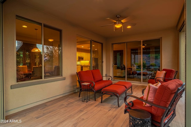 view of patio featuring ceiling fan