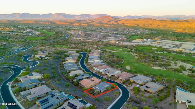 aerial view at dusk with a mountain view