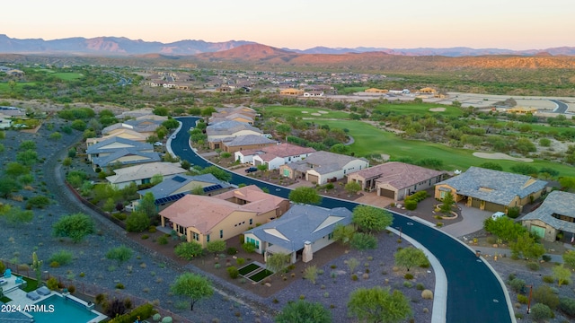 aerial view at dusk with a mountain view