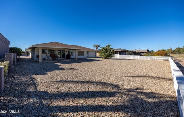 rear view of property with a patio area