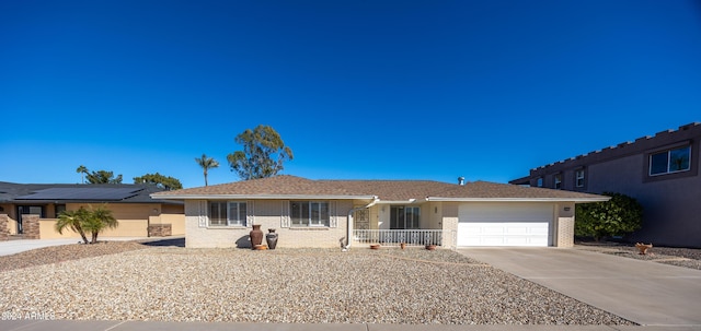 ranch-style home with a garage