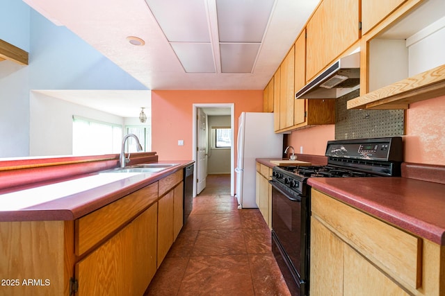 kitchen with black appliances, backsplash, under cabinet range hood, and a sink