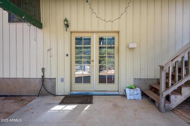 entrance to property featuring a patio and french doors