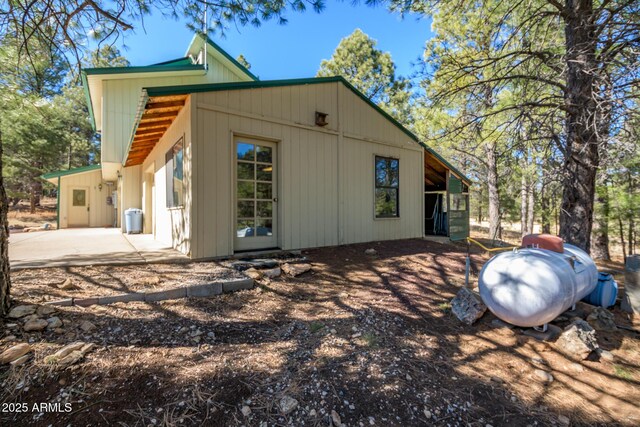 back of property featuring a patio area