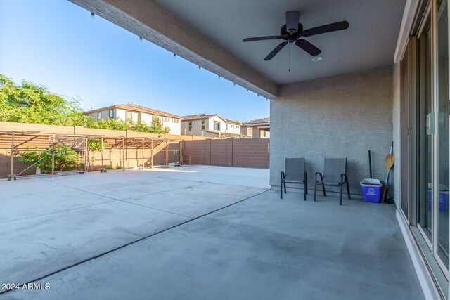 view of patio featuring ceiling fan