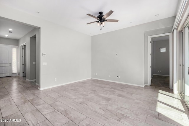 spare room featuring ceiling fan