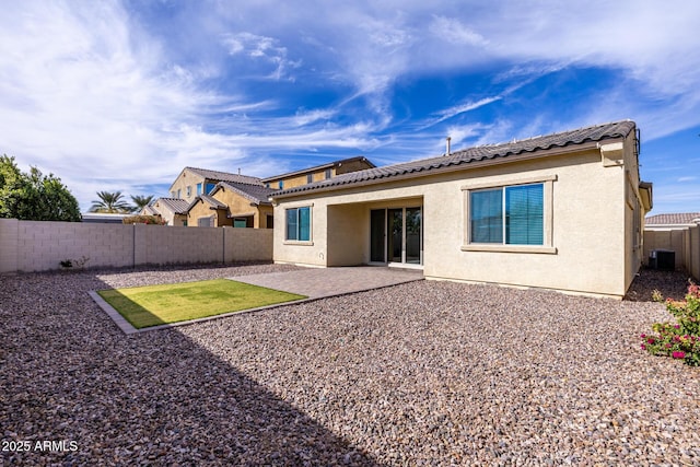 back of property featuring a patio