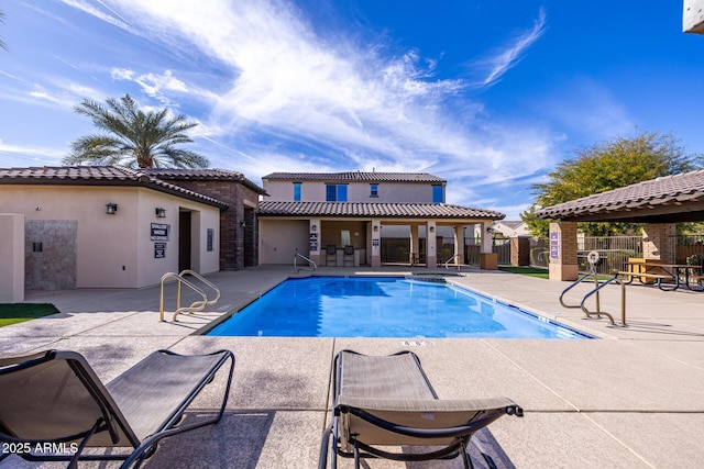 view of pool featuring a patio area