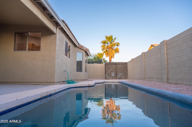 15067 W Taylor St, Goodyear, AZ 85338 - view of swimming pool with a fenced backyard