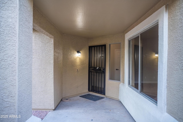 15067 W Taylor St, Goodyear, AZ 85338 - view of exterior entry featuring stucco siding