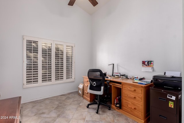 tiled office with high vaulted ceiling and ceiling fan