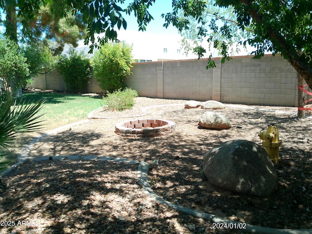 6139 E Voltaire Ave, Scottsdale, AZ 85254 - fenced backyard with a fire pit