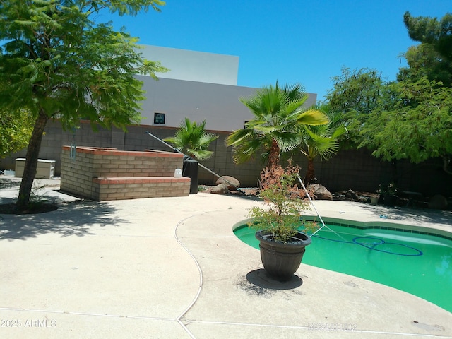 6139 E Voltaire Ave, Scottsdale, AZ 85254 - view of swimming pool featuring a patio area and a fenced backyard