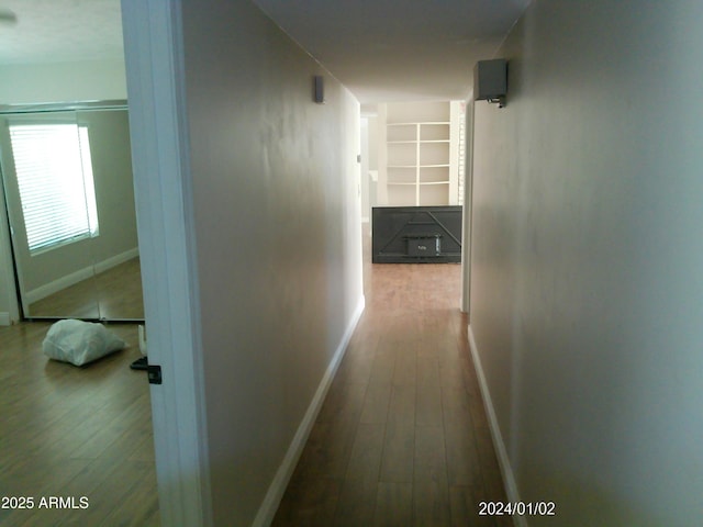 6139 E Voltaire Ave, Scottsdale, AZ 85254 - hall featuring hardwood / wood-style floors and baseboards