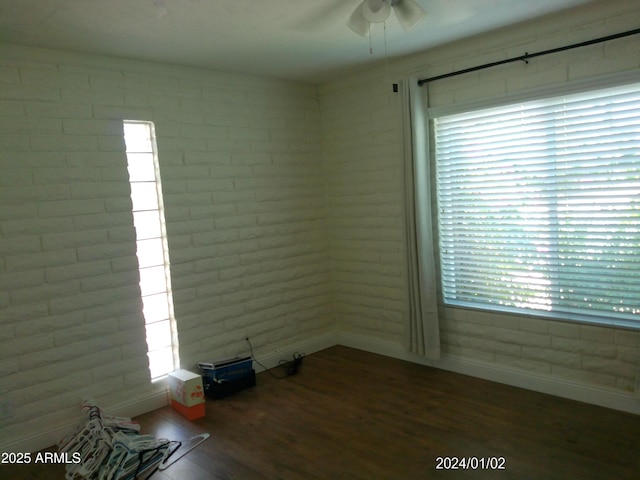 6139 E Voltaire Ave, Scottsdale, AZ 85254 - unfurnished room featuring a ceiling fan and wood finished floors