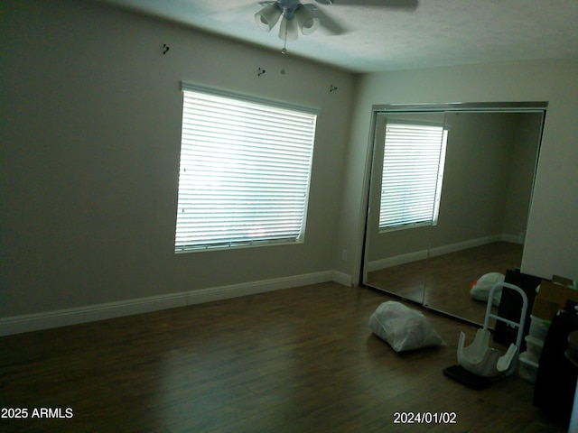 6139 E Voltaire Ave, Scottsdale, AZ 85254 - workout room with ceiling fan and wood finished floors