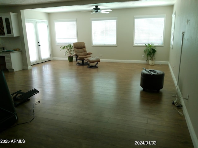 6139 E Voltaire Ave, Scottsdale, AZ 85254 - living area featuring a ceiling fan, french doors, and light wood-style floors