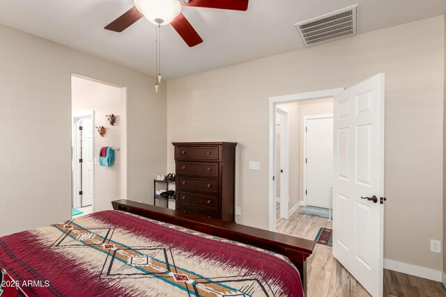 17139 S 174th Dr, Goodyear, AZ 85338 - bedroom with wood finished floors, baseboards, a ceiling fan, and visible vents