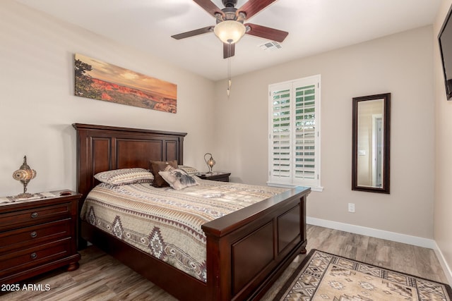 17139 S 174th Dr, Goodyear, AZ 85338 - bedroom featuring ceiling fan, light wood finished floors, baseboards, and visible vents