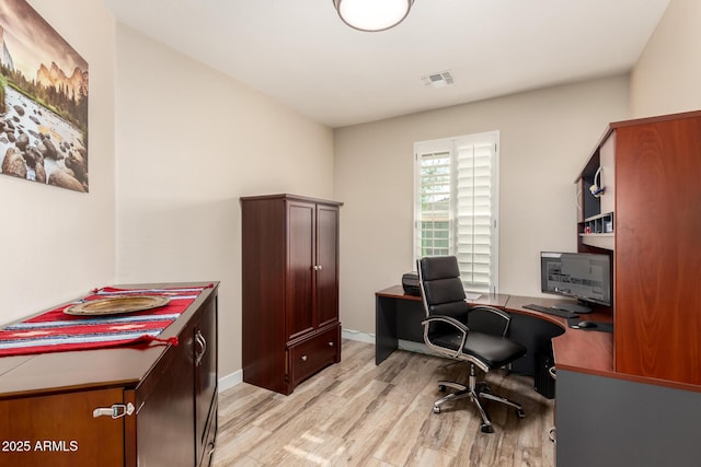 17139 S 174th Dr, Goodyear, AZ 85338 - office area featuring light wood finished floors, visible vents, and baseboards