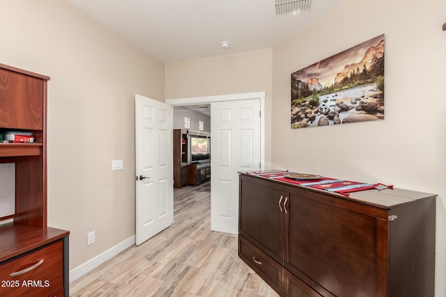 17139 S 174th Dr, Goodyear, AZ 85338 - hall featuring light wood-style flooring, baseboards, and visible vents