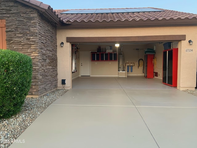 17139 S 174th Dr, Goodyear, AZ 85338 - garage featuring driveway and gas water heater