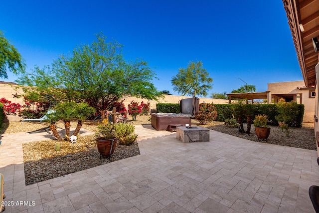 17139 S 174th Dr, Goodyear, AZ 85338 - view of patio featuring a fenced backyard and a hot tub