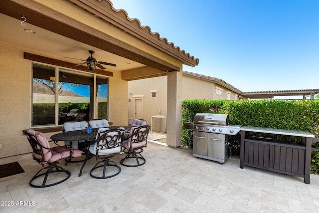 17139 S 174th Dr, Goodyear, AZ 85338 - view of patio / terrace with area for grilling, outdoor dining space, and ceiling fan