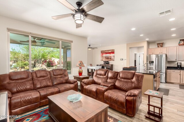 17139 S 174th Dr, Goodyear, AZ 85338 - living room featuring recessed lighting, light wood-style flooring, visible vents, and ceiling fan