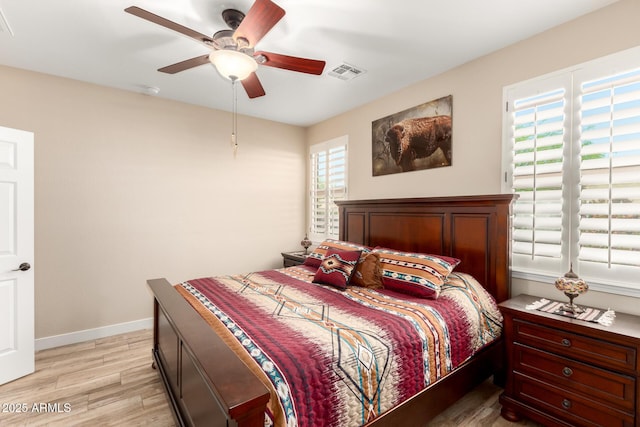 17139 S 174th Dr, Goodyear, AZ 85338 - bedroom with access to outside, light wood-type flooring, baseboards, visible vents, and ceiling fan