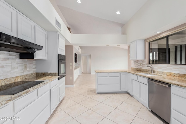 kitchen featuring black appliances, under cabinet range hood, a sink, light tile patterned flooring, and white cabinets