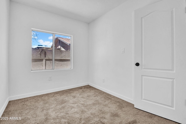 538 S Macdonald, Mesa, AZ 85210 - spare room with carpet and baseboards