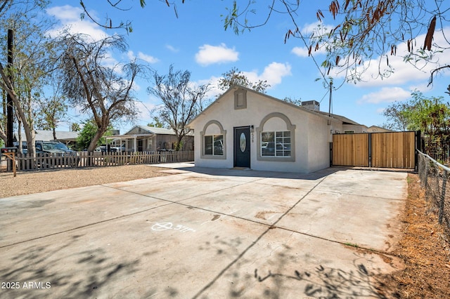 538 S Macdonald, Mesa, AZ 85210 - back of property featuring stucco siding and a gate