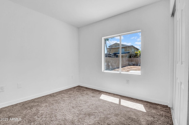538 S Macdonald, Mesa, AZ 85210 - carpeted spare room with baseboards