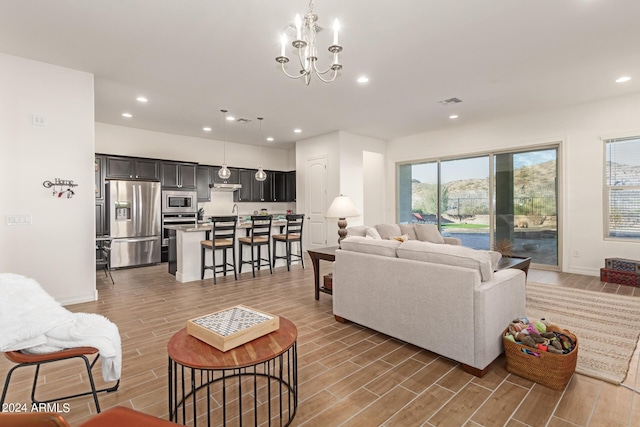 living room with an inviting chandelier