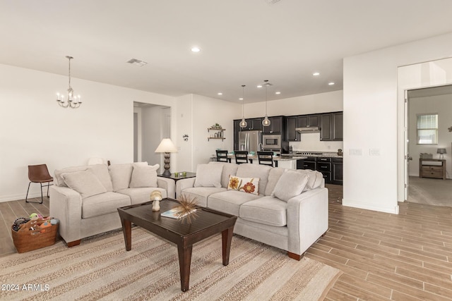 living room with a chandelier