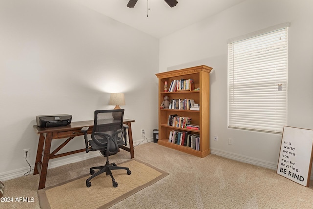 office area with carpet floors, a wealth of natural light, and ceiling fan