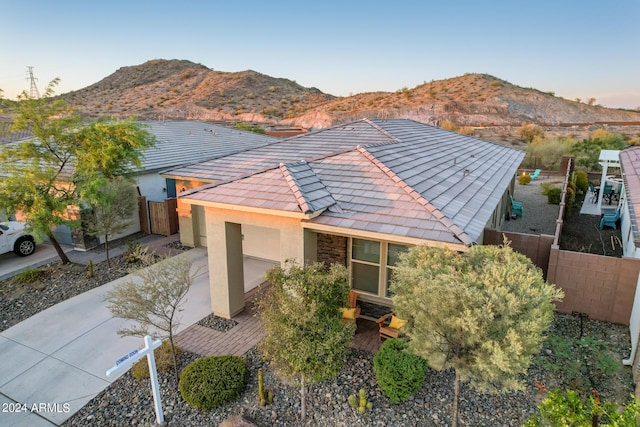 view of front of property with a mountain view