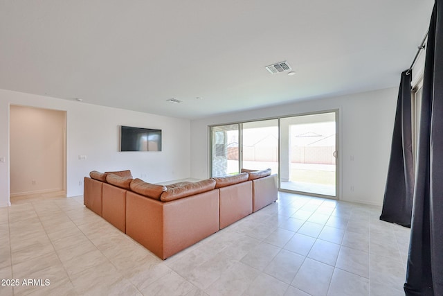17819 W Georgia Ave, Litchfield Park, AZ 85340 - living room featuring light tile patterned flooring