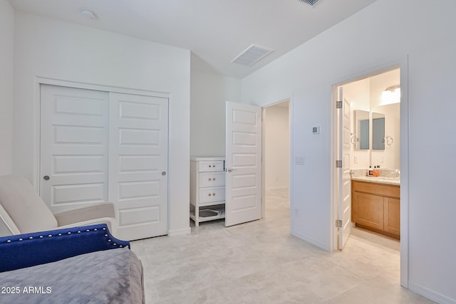 17819 W Georgia Ave, Litchfield Park, AZ 85340 - bedroom featuring a closet and connected bathroom