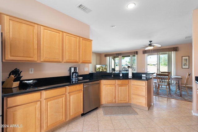 kitchen with stainless steel dishwasher, ceiling fan, light tile patterned floors, light brown cabinetry, and kitchen peninsula