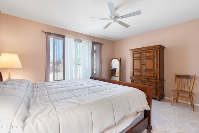 bedroom featuring ceiling fan and light tile patterned flooring