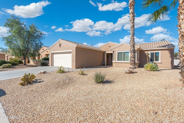 view of front of property with a garage