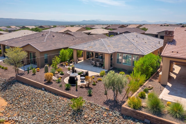 bird's eye view with a mountain view